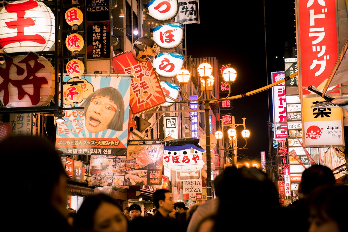 Dotonbori canal with colorful neon signs and restaurants, Osaka, Japan