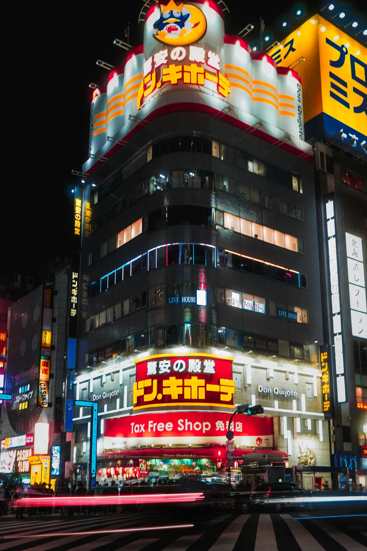 Don Quijote discount store entrance lit up at night, Tokyo, Japan