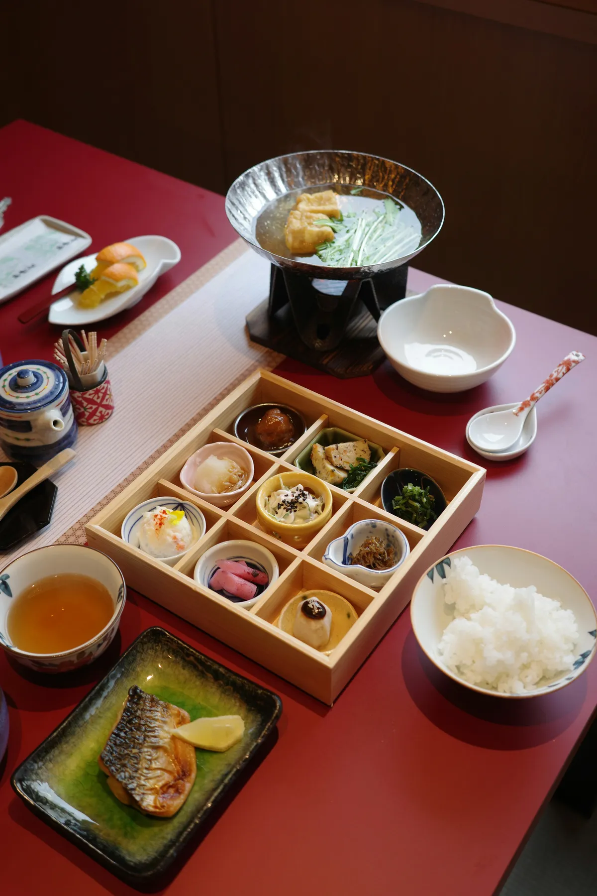 Traditional Japanese ryokan breakfast set with small dishes, Japan
