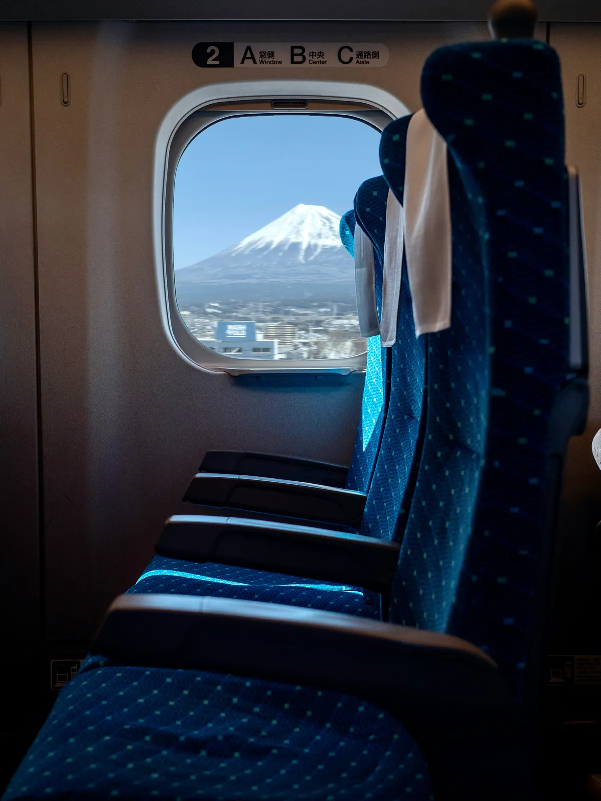 View of Mount Fuji through a Shinkansen bullet train window, Japan