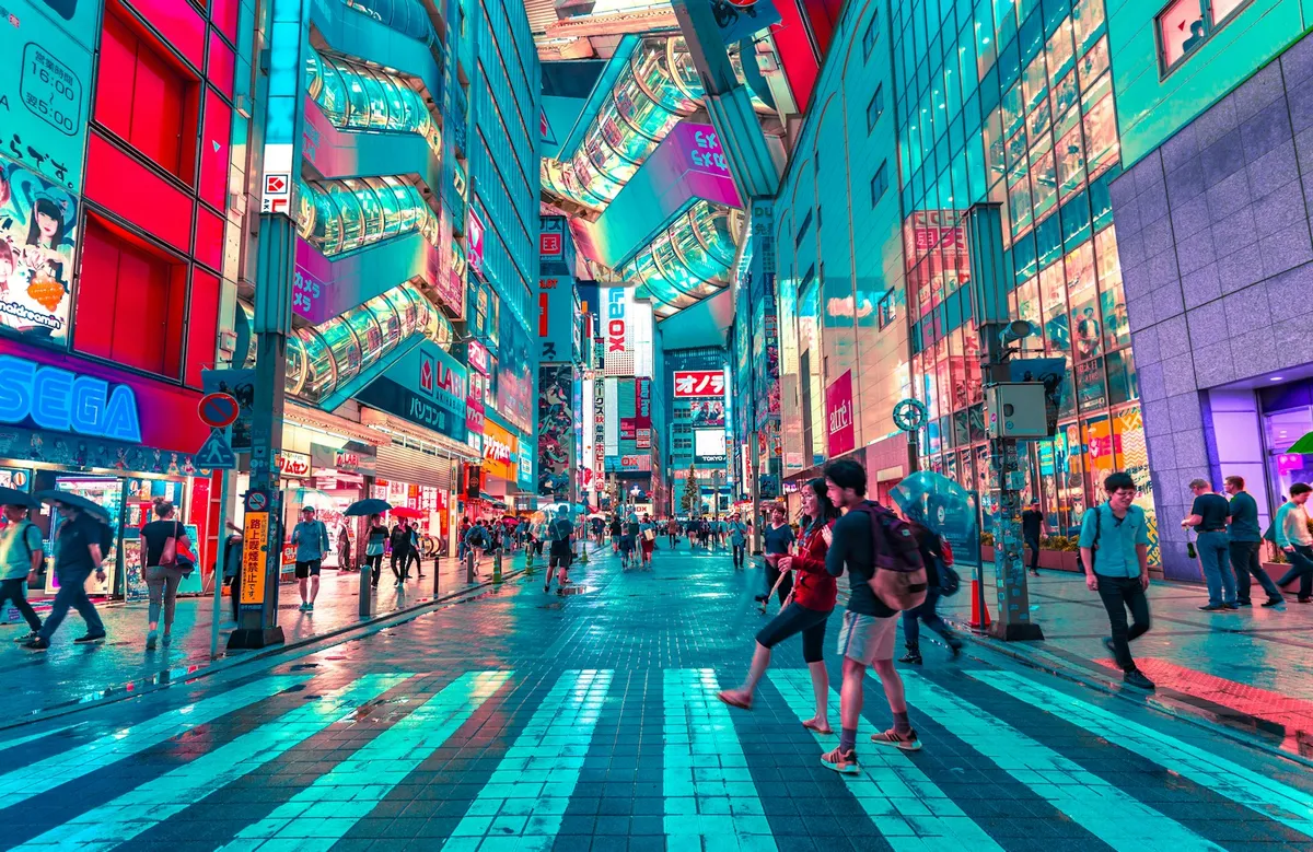 Vibrant neon-lit street in Tokyo at night
